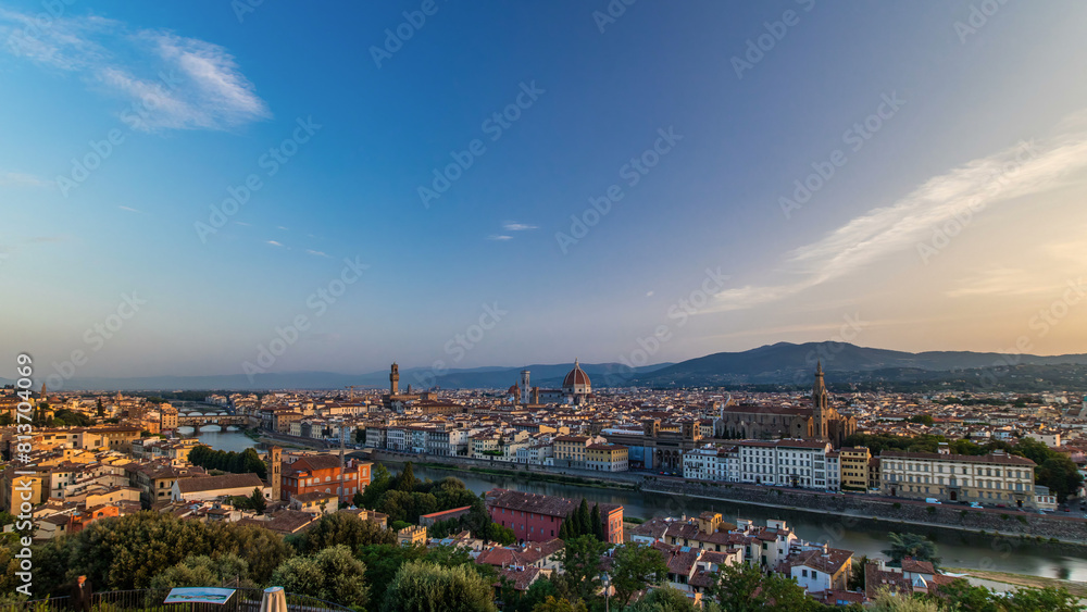 Obraz premium Top view of Florence city timelapse at sunrise with arno river bridges and historical buildings