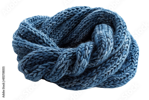 A blue knit scarf is knotted and twisted. The scarf is made of wool and is blue in color
