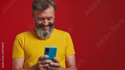 Man Laughing at Smartphone Screen © MP Studio