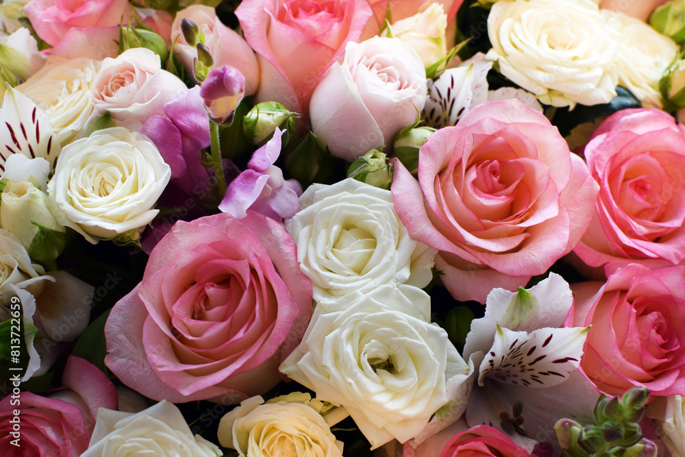 Beautiful floral background of white and pink roses. Photo of a bouquet in a flower shop Beautiful floral background of white and pink roses. Photo of a bouquet in a flower shop