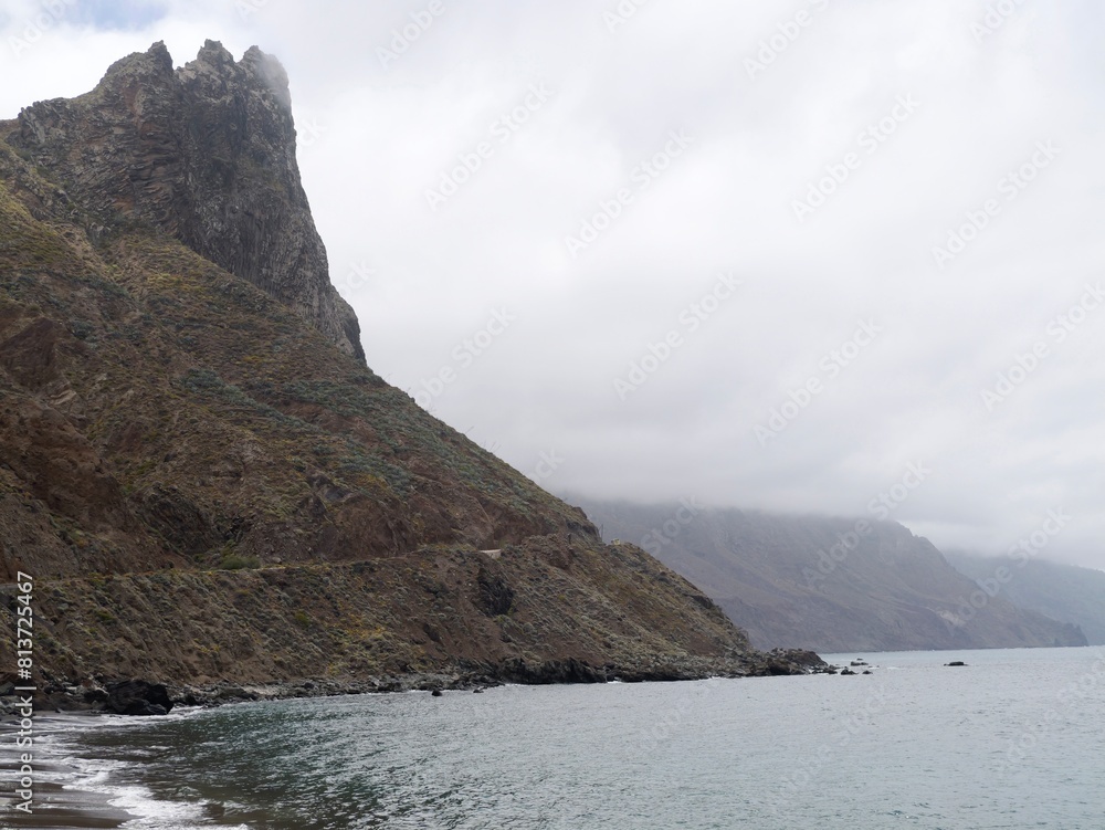 Seaside view to the beach Playa del Roque de las Bodegas and Roque de las Animas mountain from the Roque de las Bodegas, Almáciga, Anaga Rural Park, Santa Cruz de Tenerife, Canary Islands, Spain Seaside view to the beach Playa del Roque de las Bodegas and Roque de las Animas mountain from the Roque de las Bodegas, Almáciga, Anaga Rural Park, Santa Cruz de Tenerife, Canary Islands, Spain