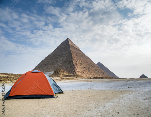 Camping Tent In Front Of Pyramids