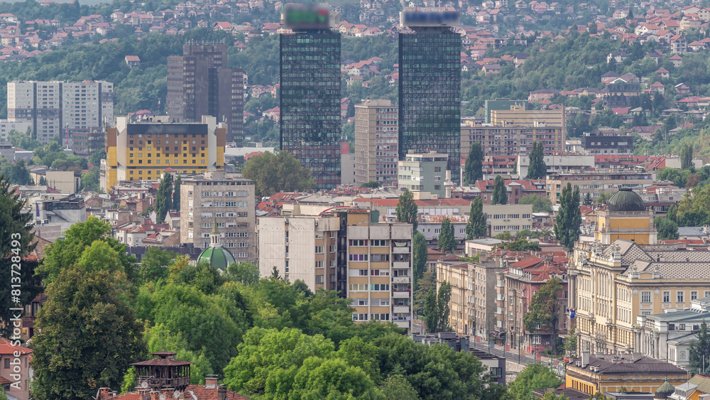 Obraz premium Aerial view of Sarajevo old town roofs and houses on the hills timelapse, Sarajevo, Bosnia and Herzegovina