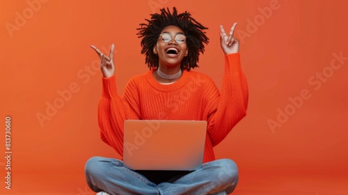 Joyful Woman with Laptop photo