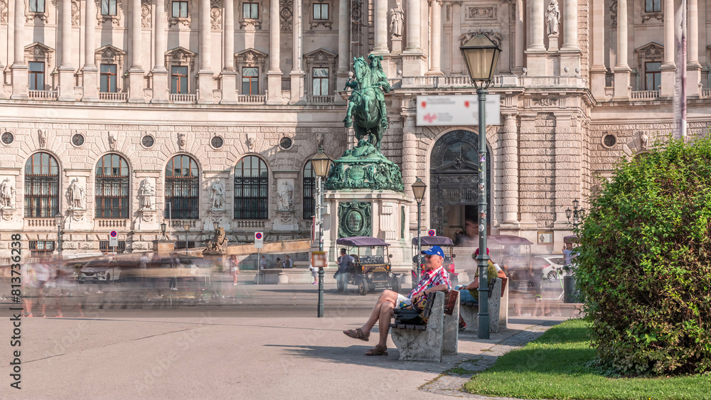 Naklejka premium Equestrian statue of Prince Eugene of Savoy timelapse in front of Hofburg palace, Heldenplatz, Vienna, Austria.