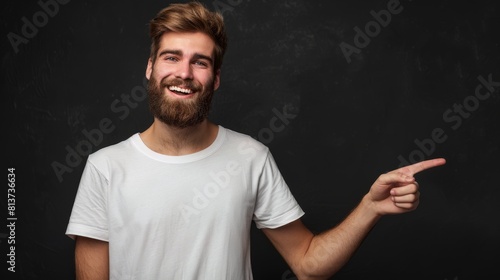 Joyful Man Pointing to the Side photo