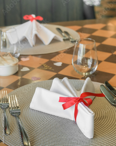 Table served with cutlery, wine glass and napkin in restaurant for lunches, dinners and events.