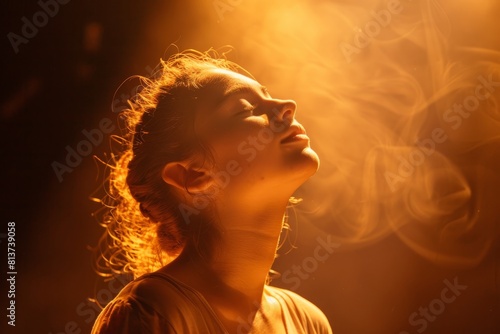 A girl engulfed in smoke, creating a dramatic and intense atmosphere around her as she performs