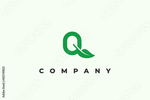 letter q and green leaf logo