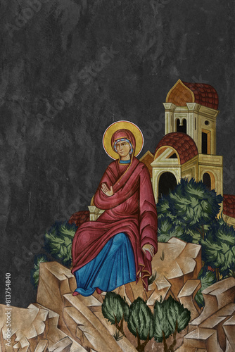 Christian traditional image of the Blessed Virgin Mary. Illustration on black stone wall background in Byzantine style