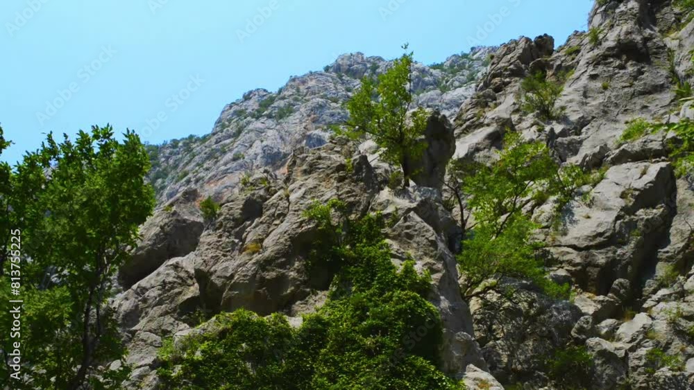Paklenica karst river canyon is national park in Croatia. It is located in Starigrad, northern Dalmatia, at southern slopes of Velebit mountain, not far from Zadar. Mala and Velika Paklenica. Paklenica karst river canyon is national park in Croatia. It is located in Starigrad, northern Dalmatia, at southern slopes of Velebit mountain, not far from Zadar. Mala and Velika Paklenica.