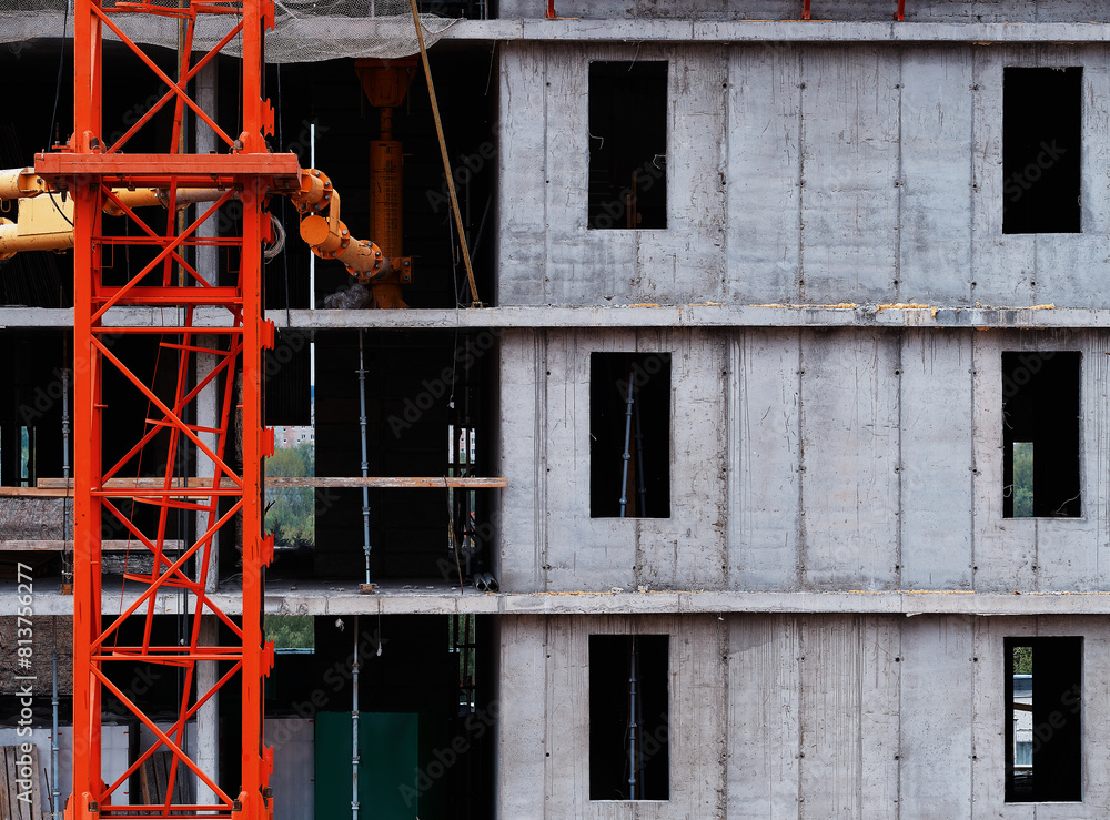 Left aligned building crane under construction background