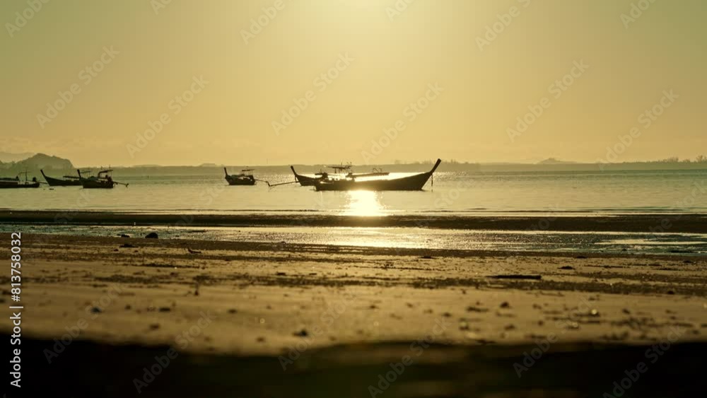 The beach in the golden hour morning during sunrise on Koh Mook The beach in the golden hour morning during sunrise on Koh Mook