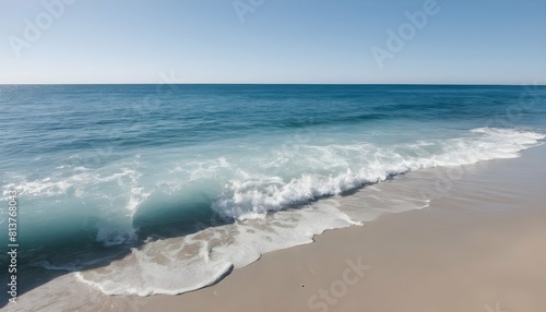 A calming ocean scene with gentle waves and a clea photo
