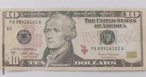 US President Hamilton on United States. American ten dollar paper banknote in close up macro. Ten USD cash macro view. 10 Dollar Cash. Ten Dollar Closeup. Finance Business Investment Success. Ten USD.