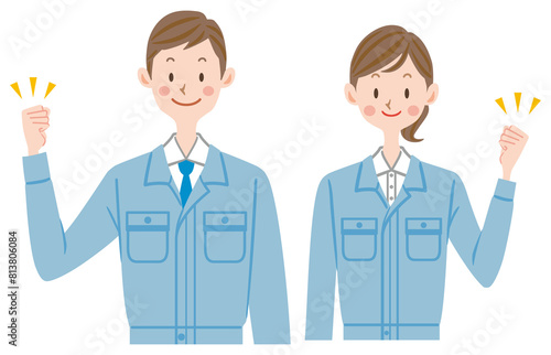 作業服を着てガッツポーズをする若い男女