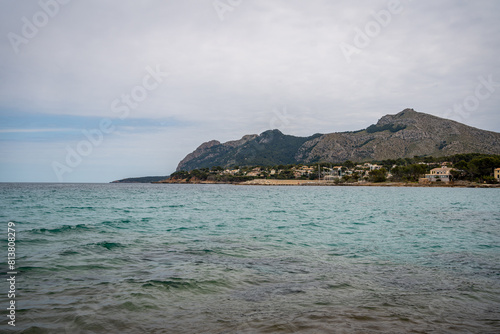 Rocky beach in the Victoria town in Mallorca Spain on a cloudy summer day