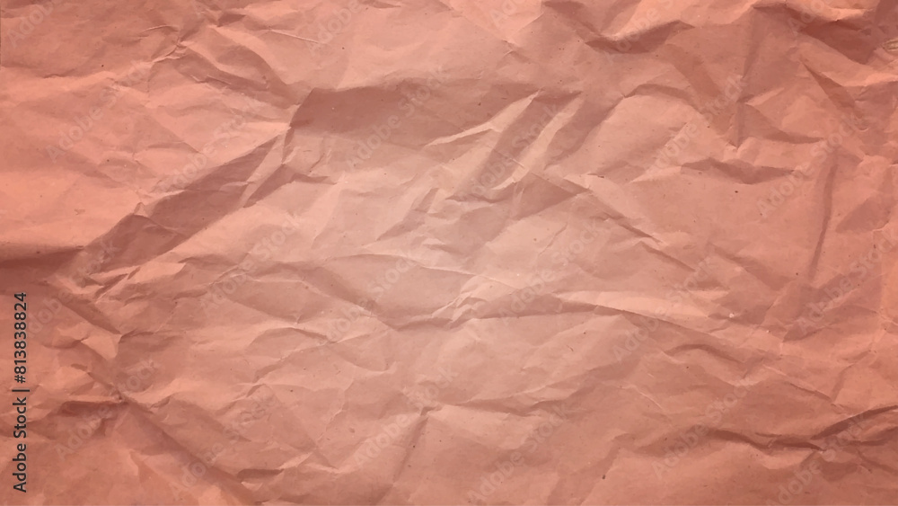 Obraz premium Brown crumpled paper pattern. Crinkled brown paper