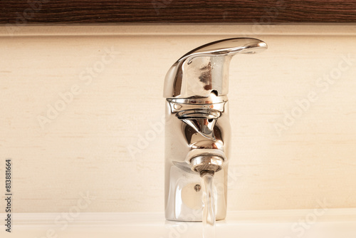 Close-up of a tap in a bathroom..General drought concept. photo