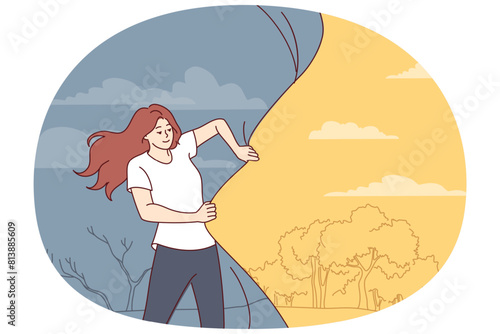 Woman is trying to change world for better and achieve better life by pulling back veil of hell. Brave girl who fights against darkness for concept striving for improvement or caring for environment