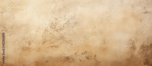 Beige photo wallpaper displaying scuffs providing a textured background with ample free space for additional images or text photo