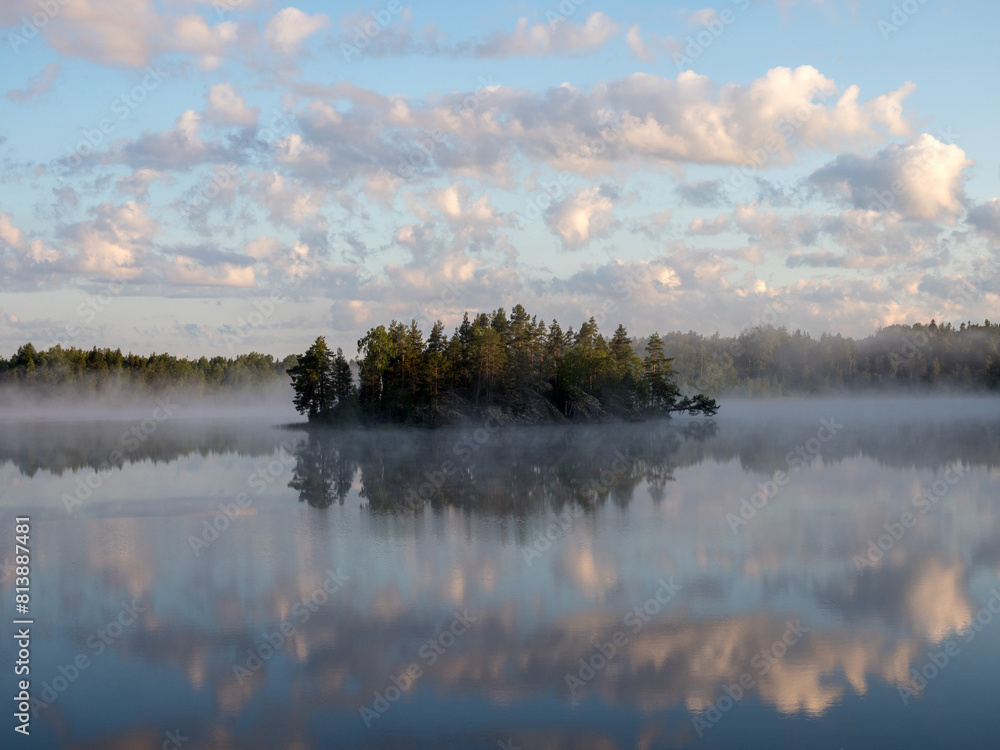 Fototapeta premium morning landscape with an island and fog
