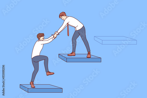 Business man helps partner climb career ladder, demonstrating readiness for collaboration and devotion. Collaboration of two office employees making careers together and reaching new heights