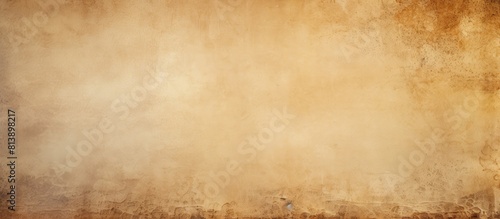 Beige photo wallpaper displaying scuffs providing a textured background with ample free space for additional images or text photo