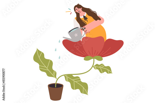 Woman watering giant potted home flower for self development and mental wellbeing concept