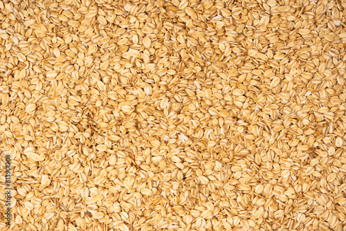 Oat-flakes as a background. Top view.