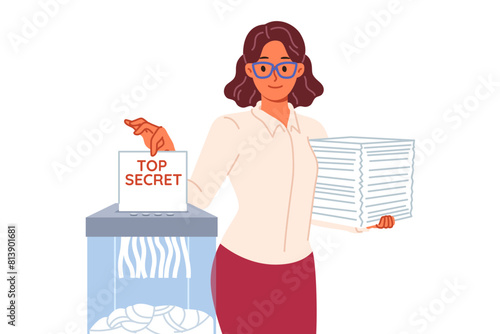 Woman shreds classified documents using shredder to destroy confidential and sensitive information. Lady politician uses shredder to hide data proving crime or ineffective work of parliament