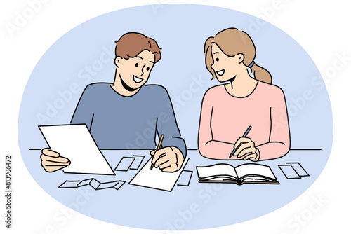 Smiling couple sit at desk managing finances. Happy man and woman take care of household budget, planning expenses. Vector illustration.