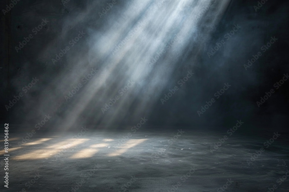 A mysterious dark room with a single source of light shining from the ceiling. Perfect for illustrating solitude or contemplation A mysterious dark room with a single source of light shining from the ceiling. Perfect for illustrating solitude or contemplation
