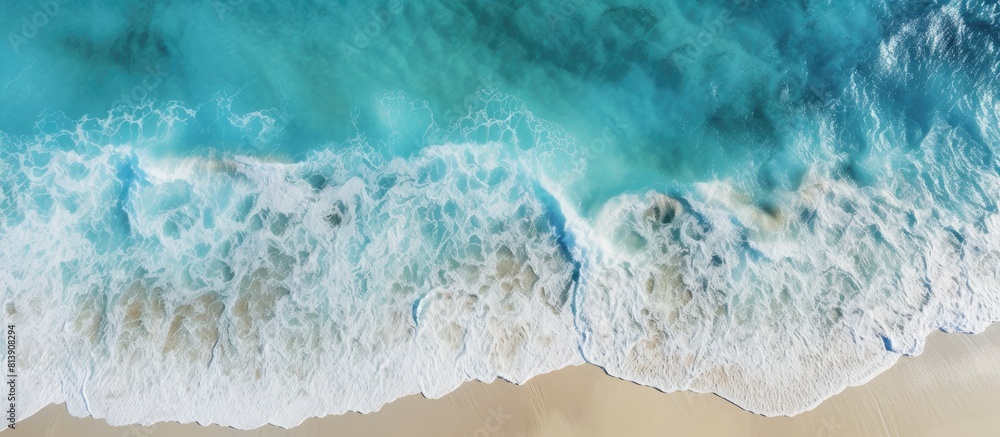 A stunning top view aerial image of a beach with turquoise water offers copy space for your advertising text A stunning top view aerial image of a beach with turquoise water offers copy space for your advertising text