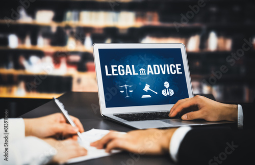 Smart legal advice website for people searching for savvy law knowledge in laptop computer on a desk in library of university or college