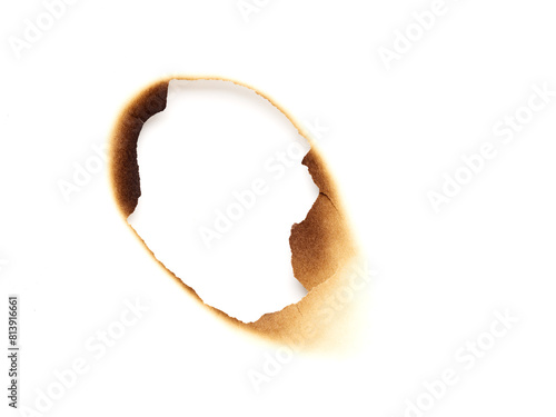 Hole in paper surface. Burned effect background