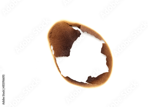 Hole in paper surface. Burned effect background