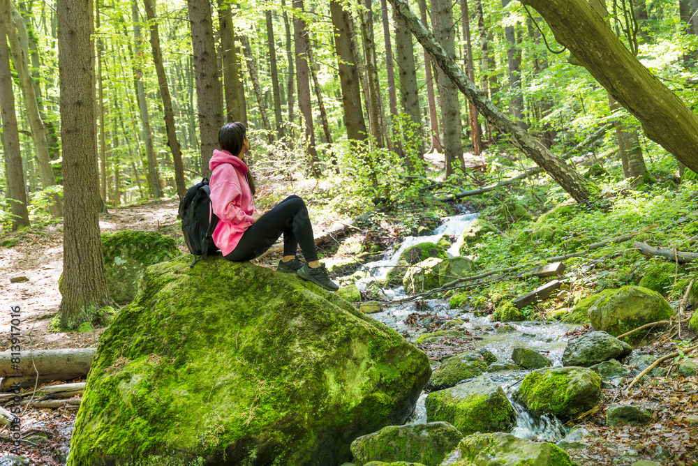 Traveler Woman in the spring green forest .Vitosha Mountain ,Bulgaria Traveler Woman in the spring green forest .Vitosha Mountain ,Bulgaria