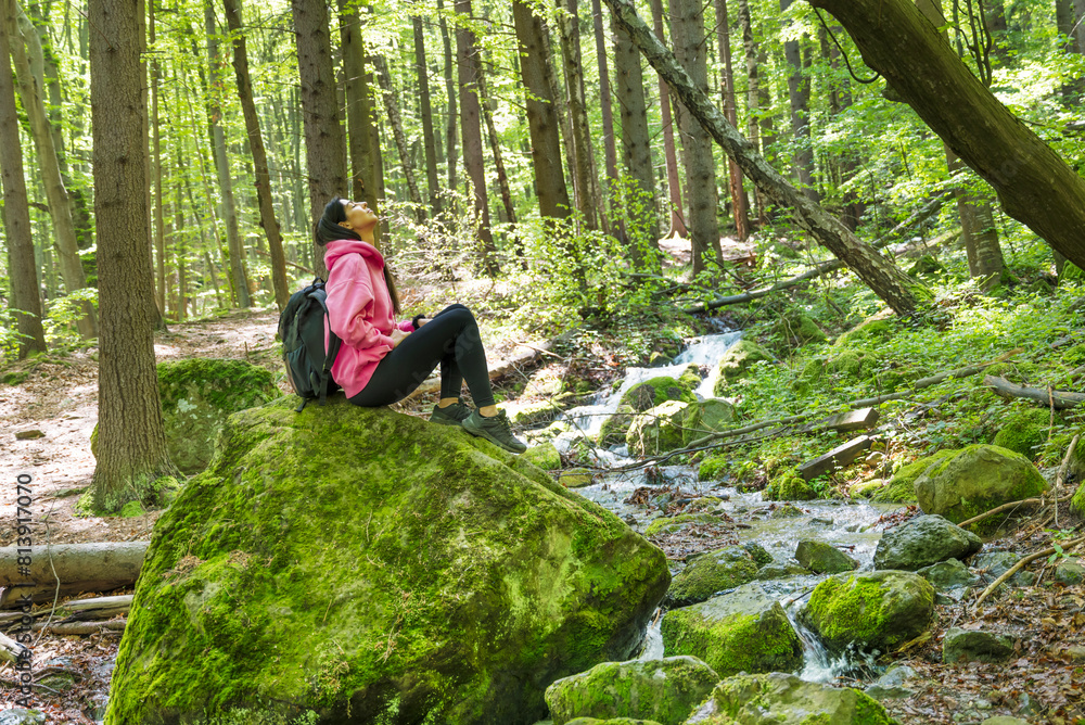 Traveler Woman in the spring green forest .Vitosha Mountain ,Bulgaria Traveler Woman in the spring green forest .Vitosha Mountain ,Bulgaria