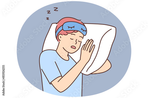 Tired guy sleep on pillow in bed