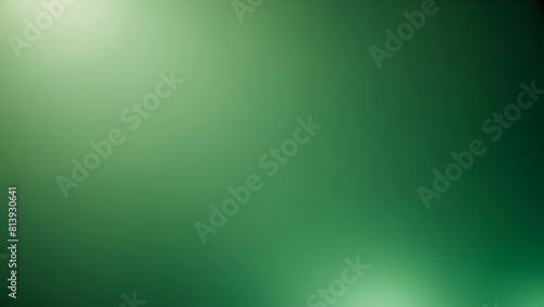 Person holding tennis racket in front of blurred green background
