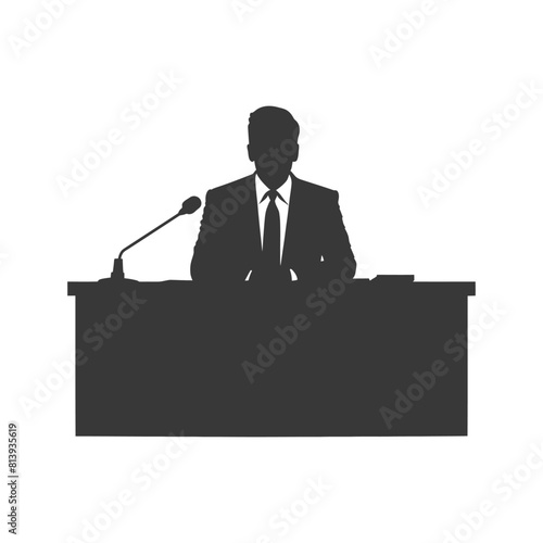 Silhouette news anchor man in action sit in front desk black color only