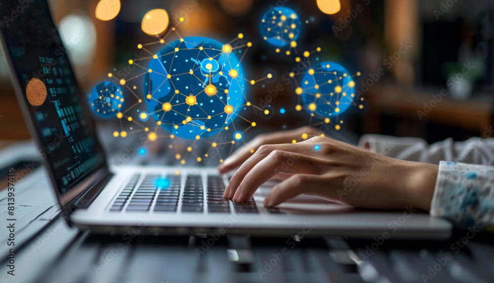 Female professional using laptop with futuristic network graphics overlay Female professional using laptop with futuristic network graphics overlay
