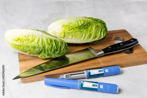 Original Danish Ozempic Insulin injection pen for diabetics and vegetables. Denmark - May 2, 2024 photo