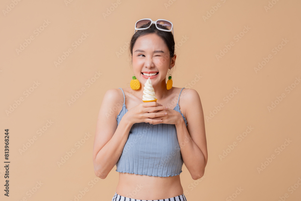 summer freshness asian cheerful swimwear woman wear sun glasses hand hold ice cream sweet dessert smiling happiness summertime advertisment studio photoshoot cute and curious friendly on color screen summer freshness asian cheerful swimwear woman wear sun glasses hand hold ice cream sweet dessert smiling happiness summertime advertisment studio photoshoot cute and curious friendly on color screen