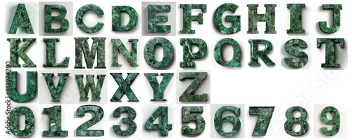 set of alphabet made of green marble isolated on white