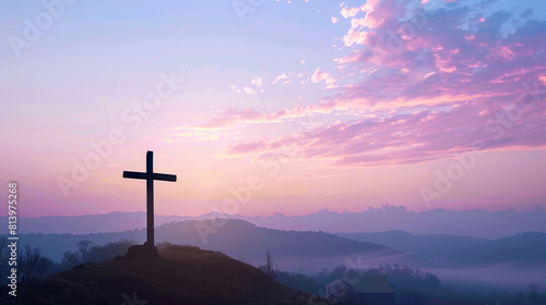 A serene dawn sky with soft pastel colors as the backdrop for a silhouetted Christian cross on a distant hilltop, bathed in the gentle light of the rising sun.