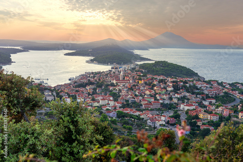 scenic view of the croatian losinj islands in the kvarner gulf at sunset from above with sunbeam