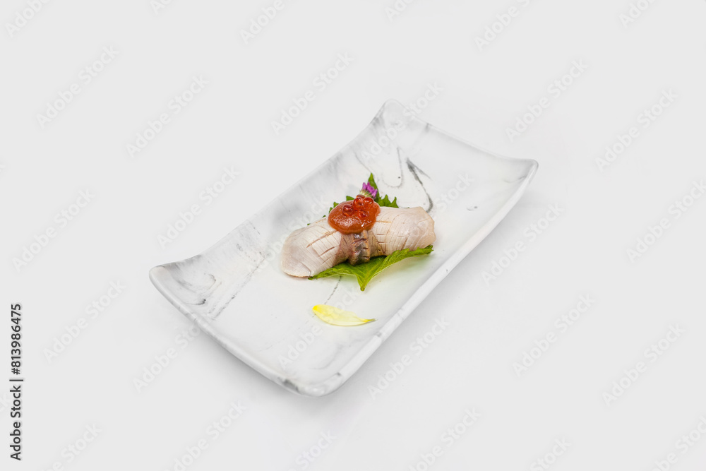 Burn Kampachi Sushi with Saikyo Sauce on top serve on marble plate Burn Kampachi Sushi with Saikyo Sauce on top serve on marble plate