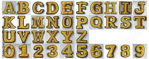 set of alphabet made of yellow embroidery with black edges isolated on white